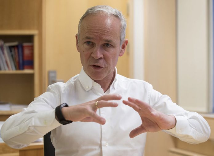 Kommunal- og moderniseringsminister Jan Tore Sanner held fram med arbeidet med kommunereforma i 2018. Foto: Terje Bendiksby / NTB scanpix